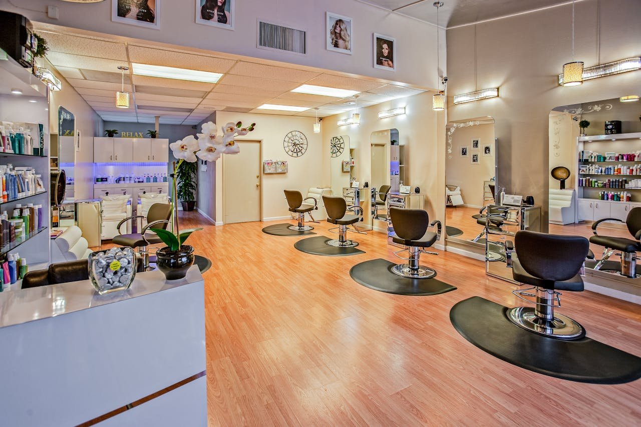Home Spacious and stylish hair salon interior in Del Mar, CA showcasing chic design.