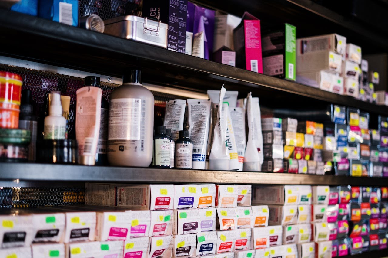 Home Professional hair products neatly organized on salon shelves, ideal for hairstylists.